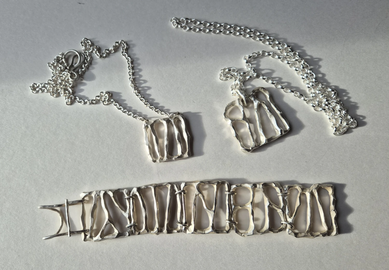Bracelet and necklaces; cast silver and forged findings, dimensions vary