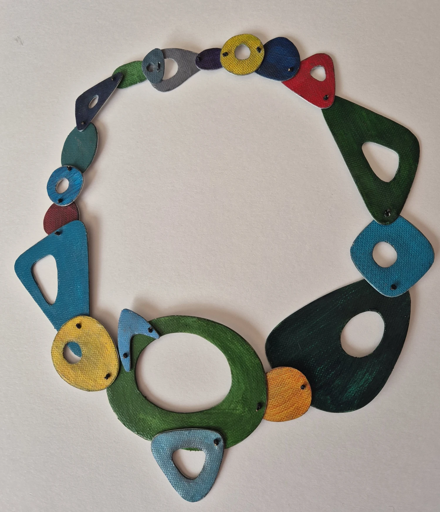 Necklace; Mixed media and leather cord, dimensions vary