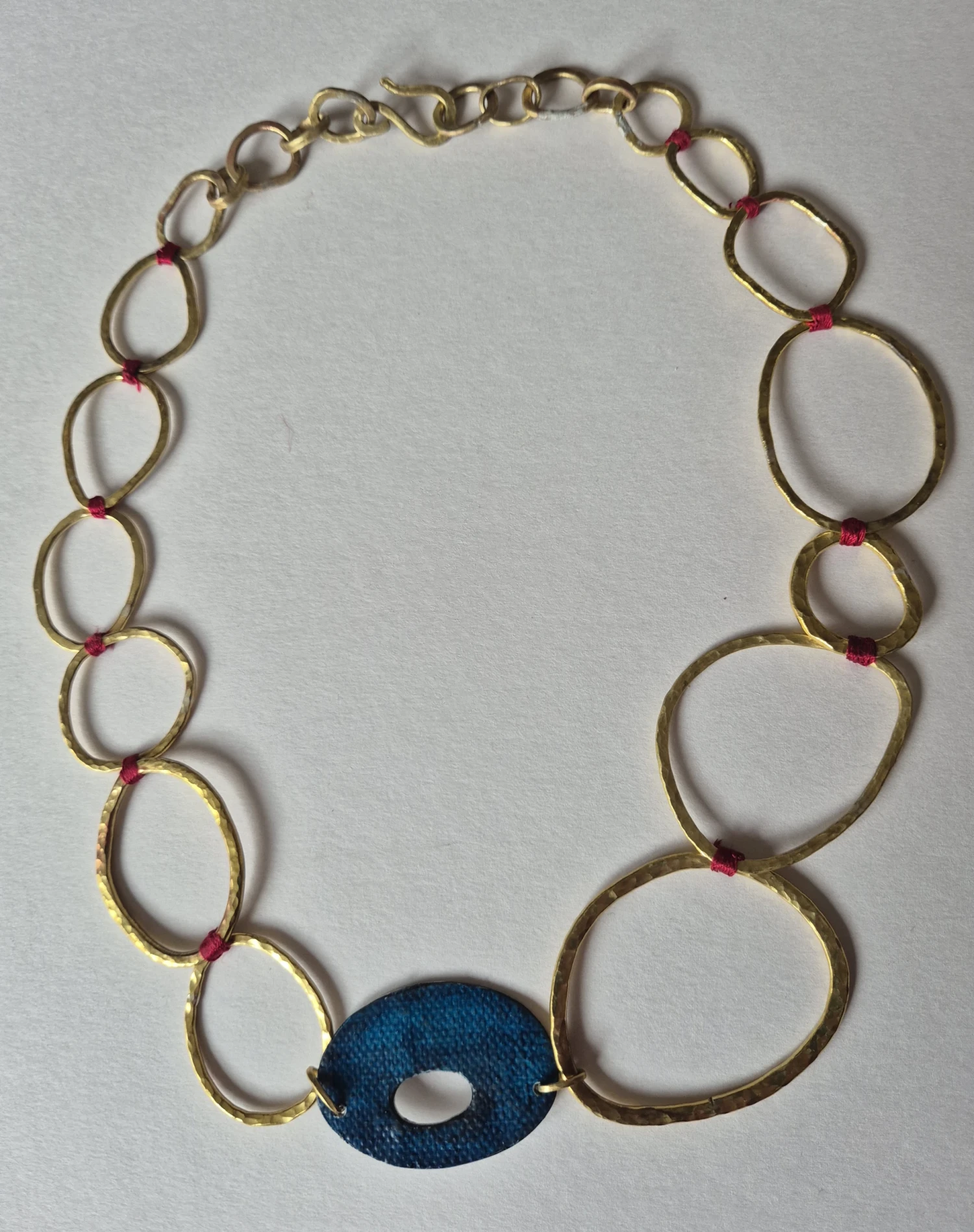 Forged brass necklace with silk thread and mixed media element; dimensions vary