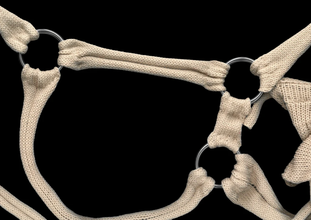 Knitted beige straps connected by silver rings.