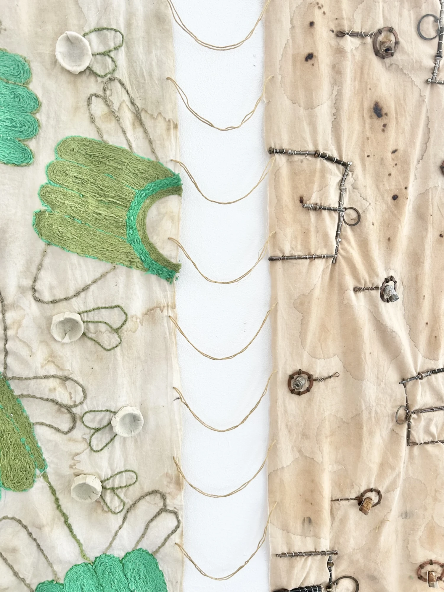 Close up of linked wall hangings