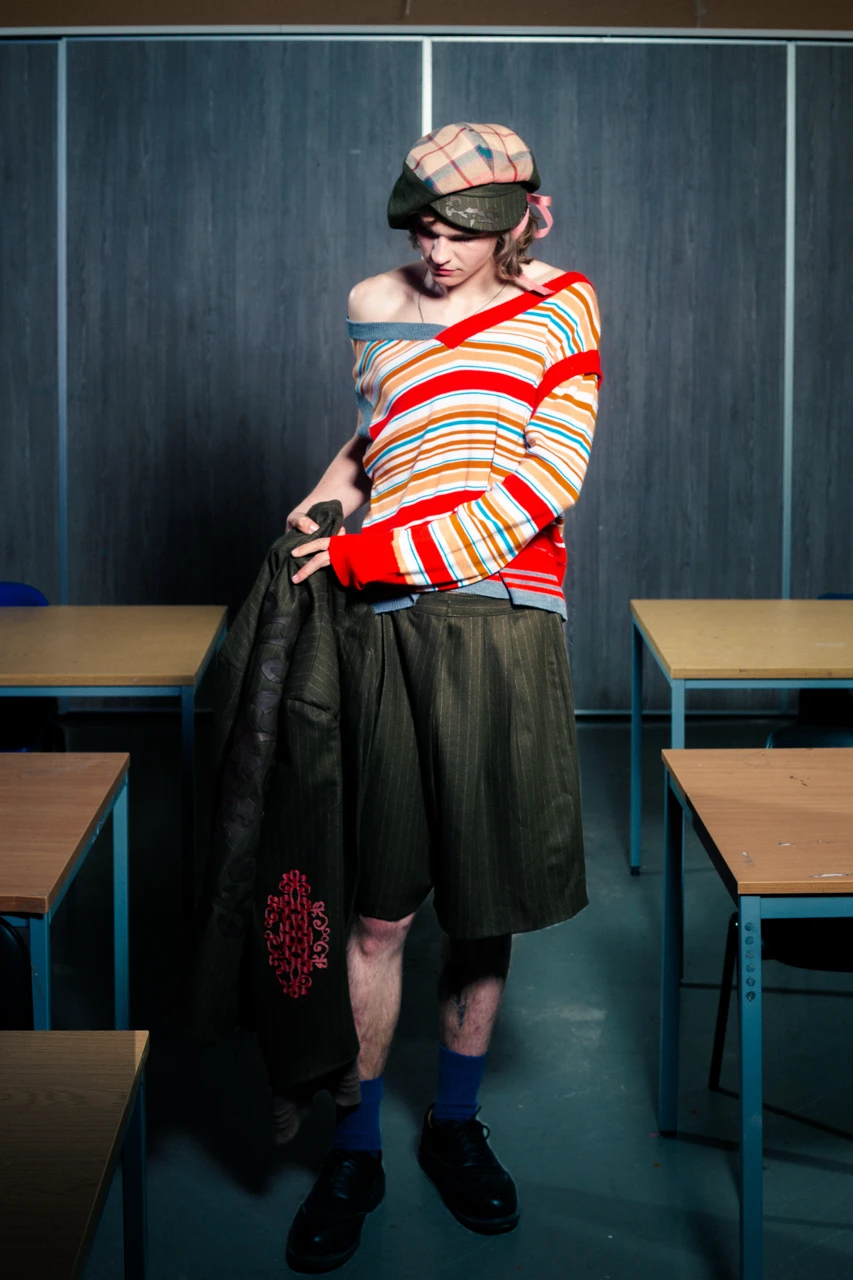 Arjius in *Knitted Transforming Vest Jumper*.