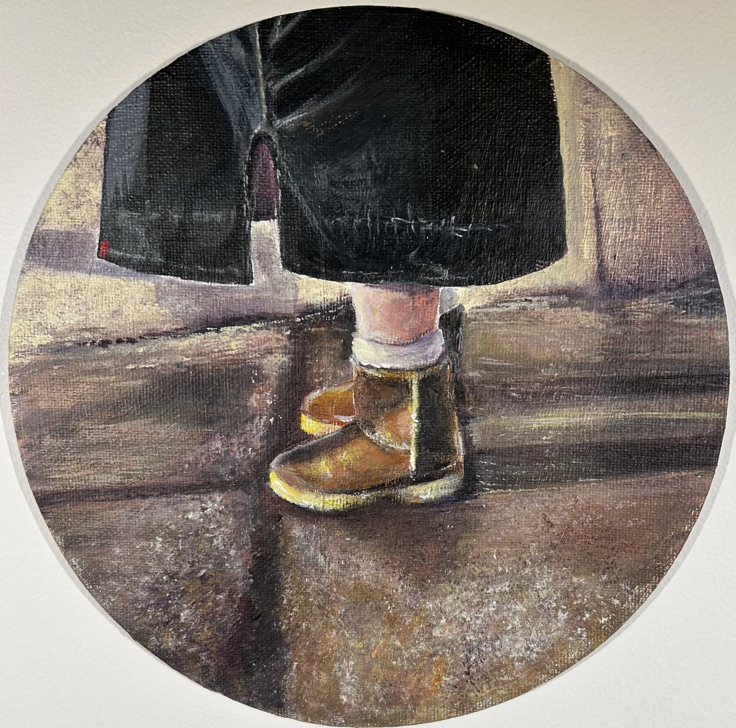 *Boots*, 2025, acrylic on canvas board, 20 cm diameter.