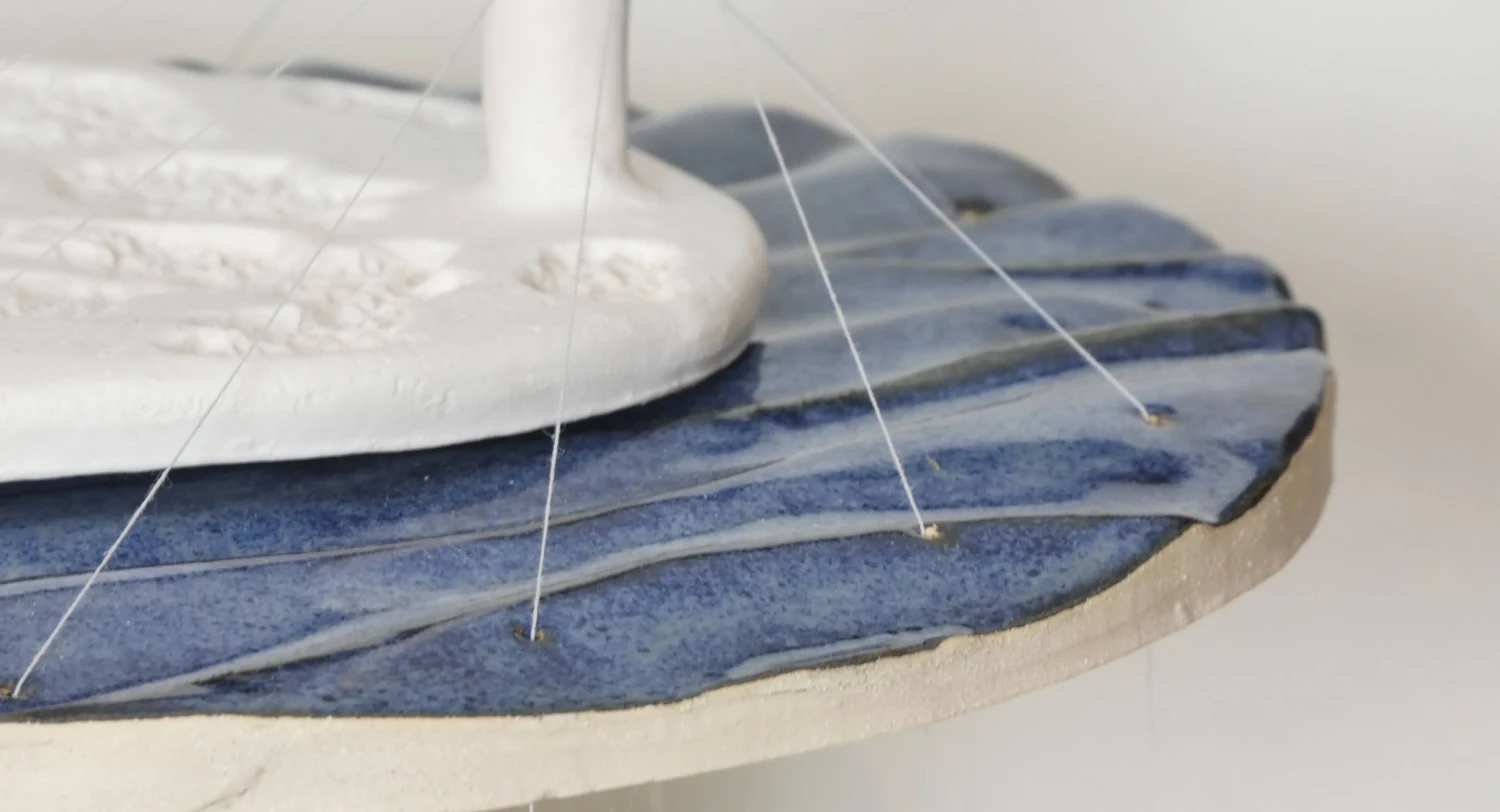 *Orbital Tension*, stoneware, porcelain and catgut, 35 x 25 x 25 cm.