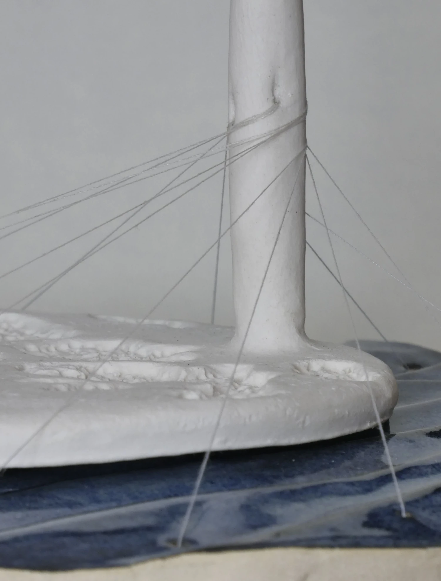 *Orbital Tension*, stoneware, porcelain and catgut, 35 x 25 x 25 cm.