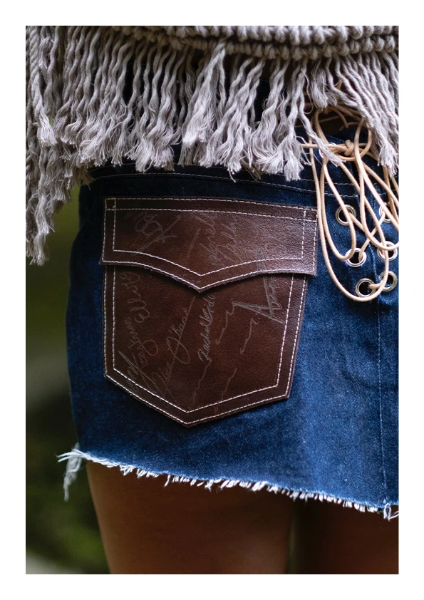 *Look 2*, laser cut signatures close-up detail.