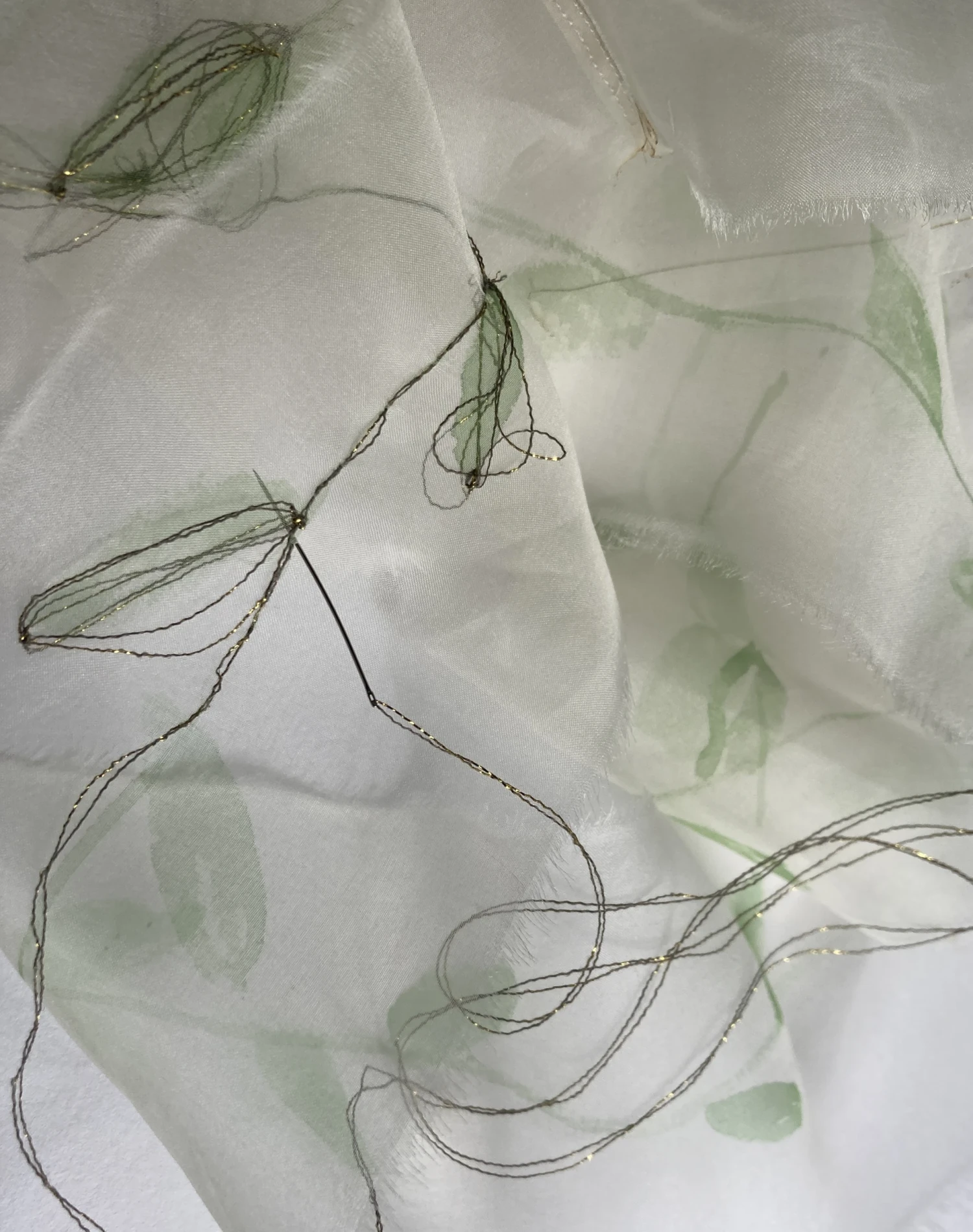 Detail: silk and silk organza, hand-painted, hand-embroidered. 