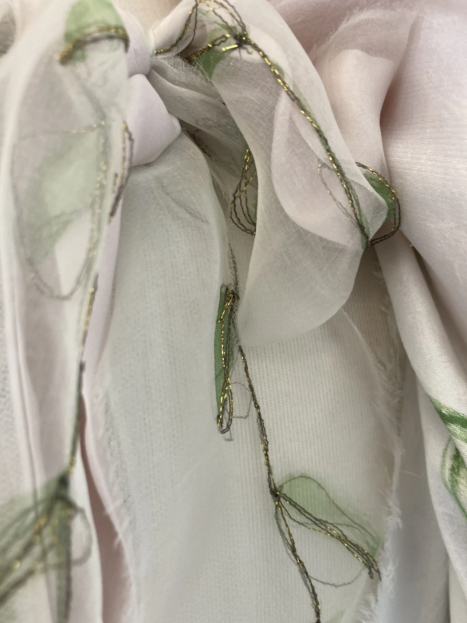 Detail: silks, hand-painted, hand-embroidered.