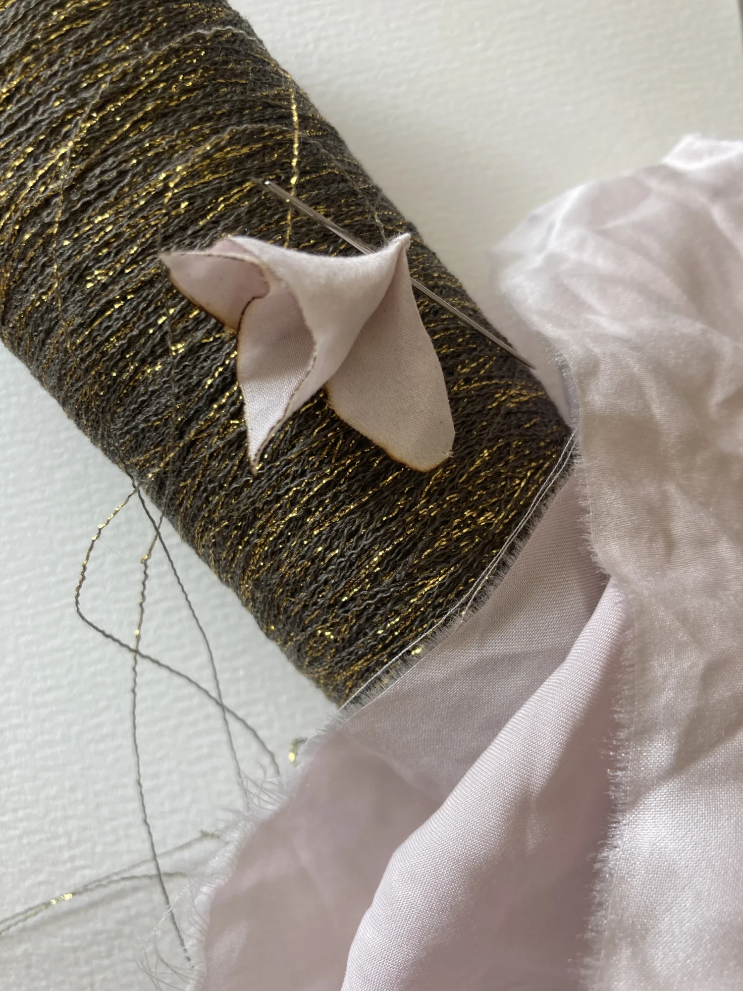 Detail: mulberry silk, burned, hand-stitch.