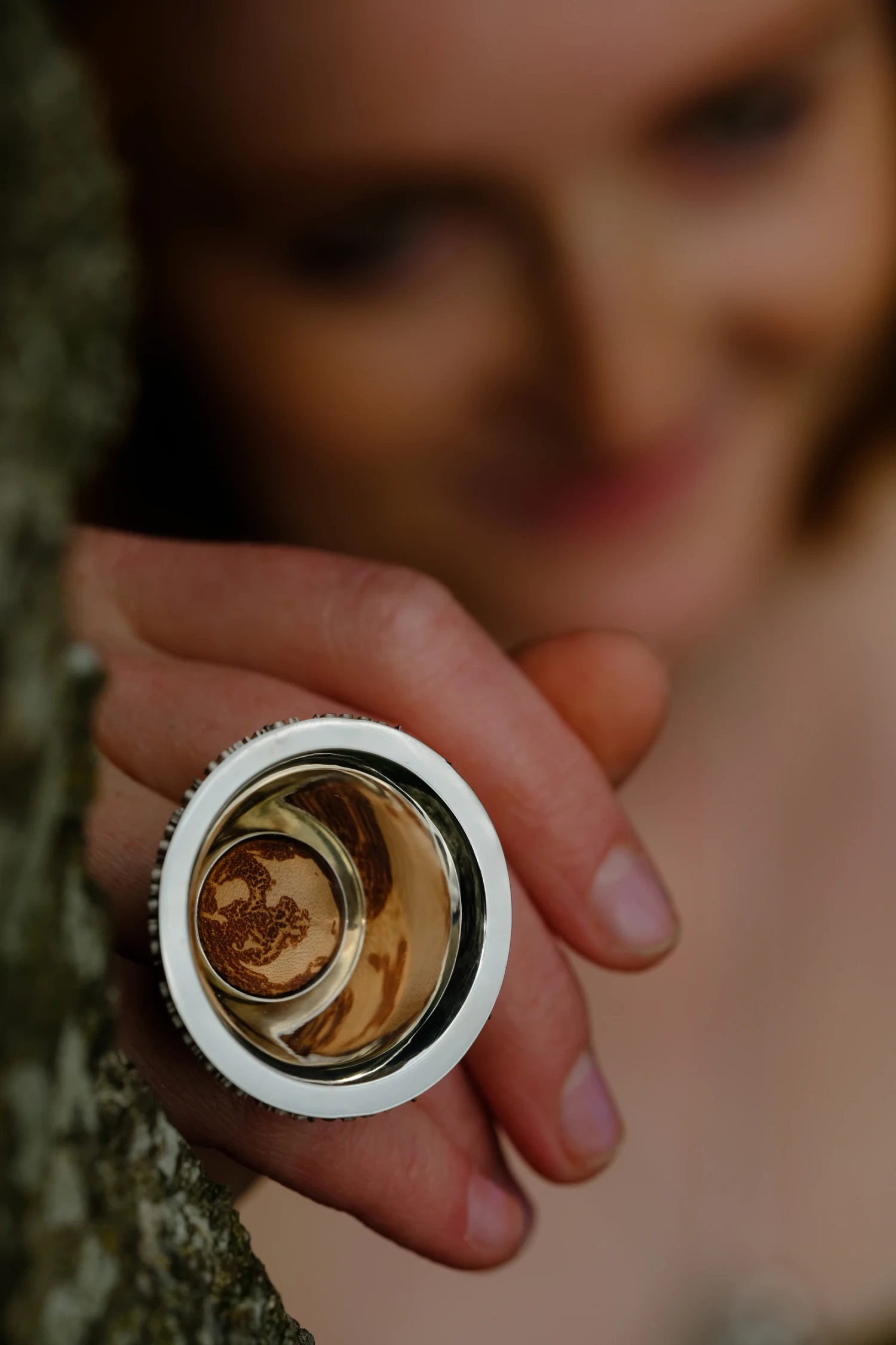 *Reflection*, ring, Sterling silver, laser etched vegetable tanned Vachetta leather.