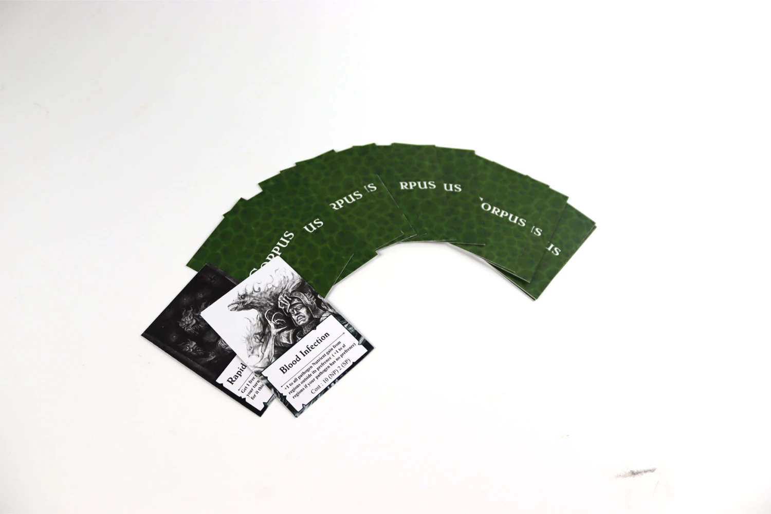 *Pathogen* cards, printed design on paper, 6.4 x 8.8 cm.