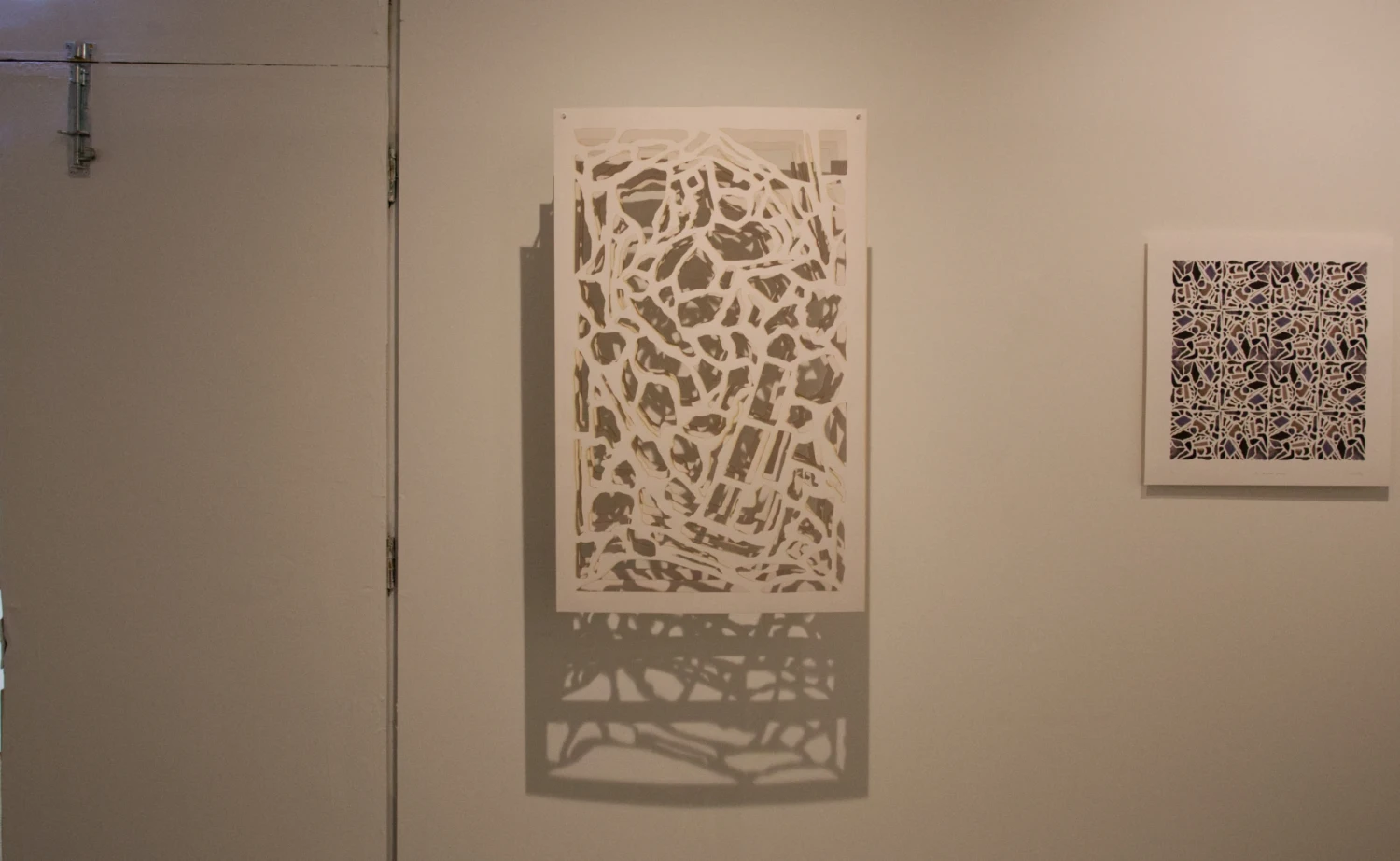 *Depths*, 3 screen-printed and laser-cut layers suspended on aluminium dowels.