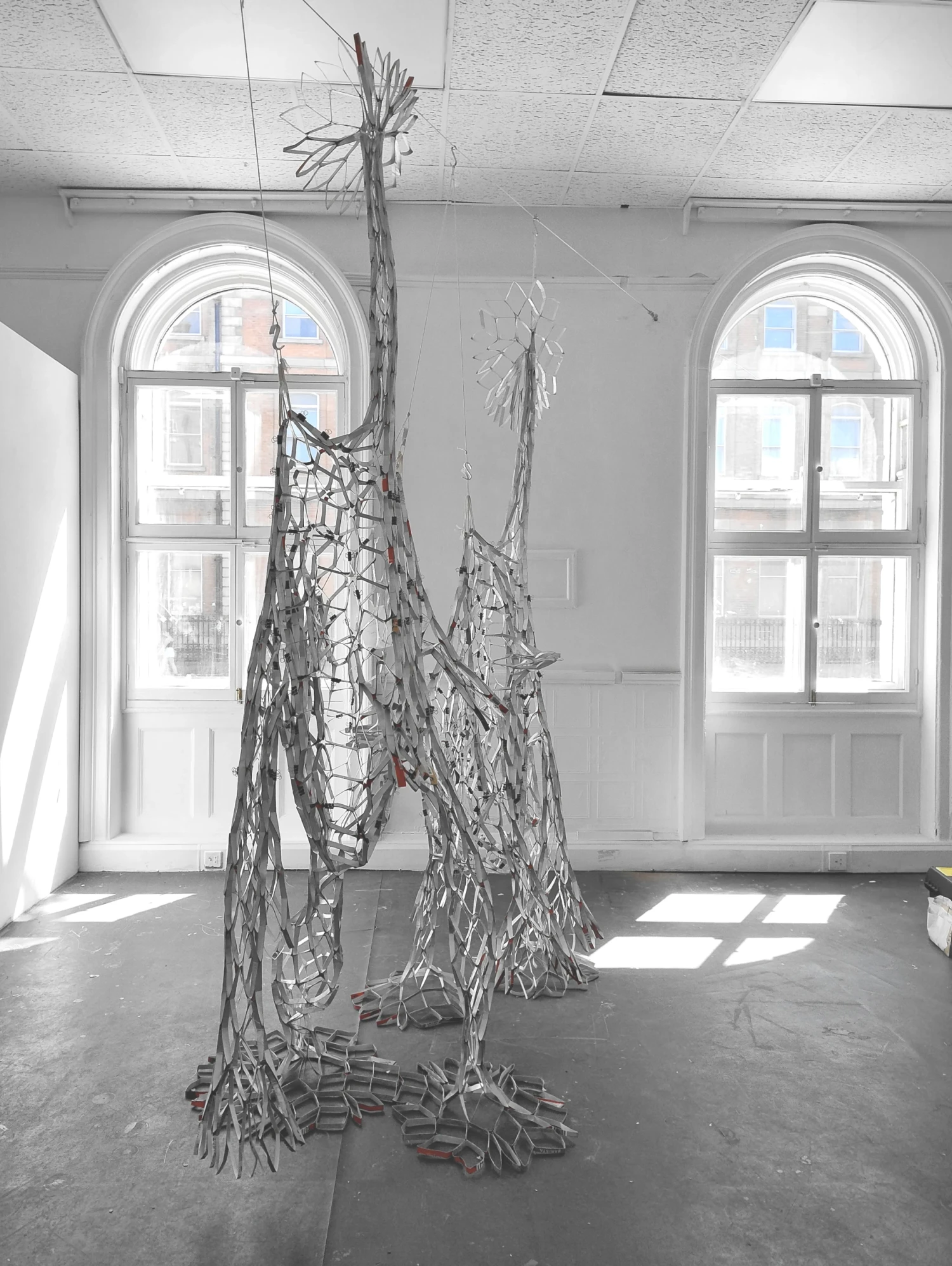 *Reciprocal Space*, beverage cartons, tape, gesso, 280 x 180 x 90 cm.