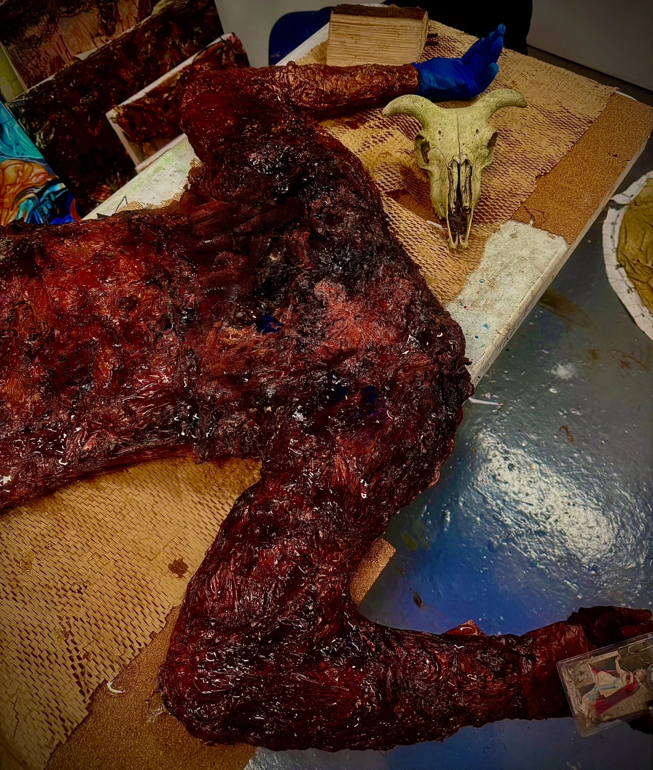 *Bog Body*, card, bandages, cling film, cloth and acrylic paint.