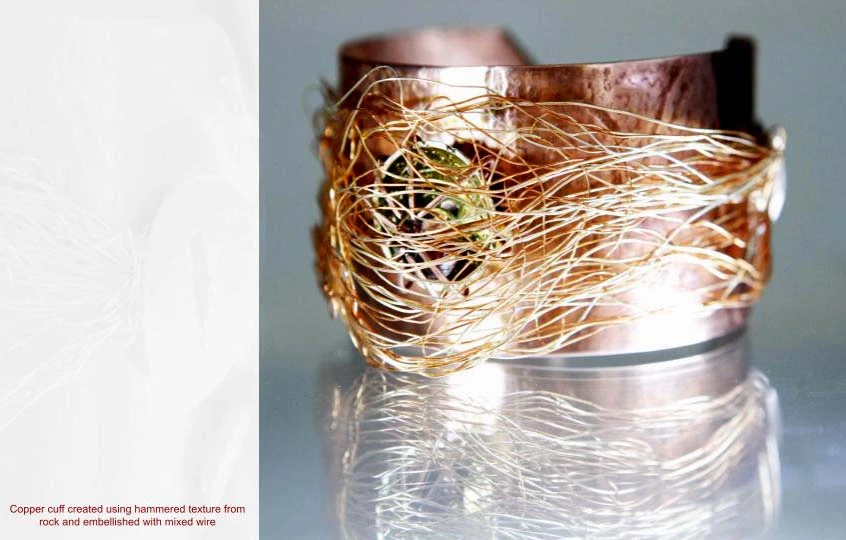 Hammered textured cuff with mixed wire embellishment.