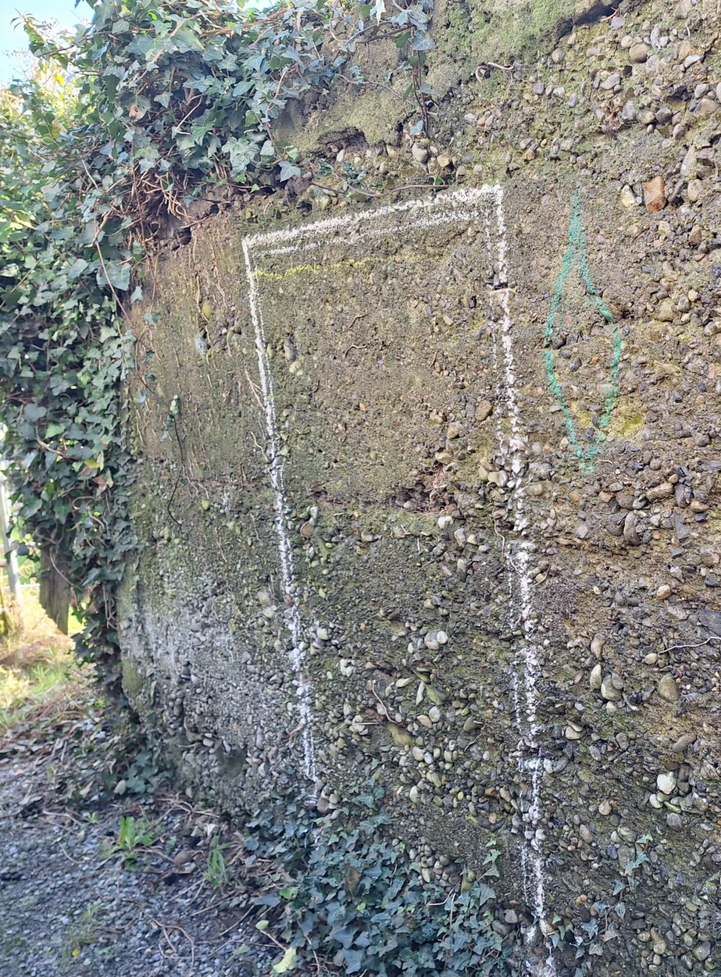 Chalk drawing on old mass concrete wall inspired by chalk artist, Bart Lodwijks.