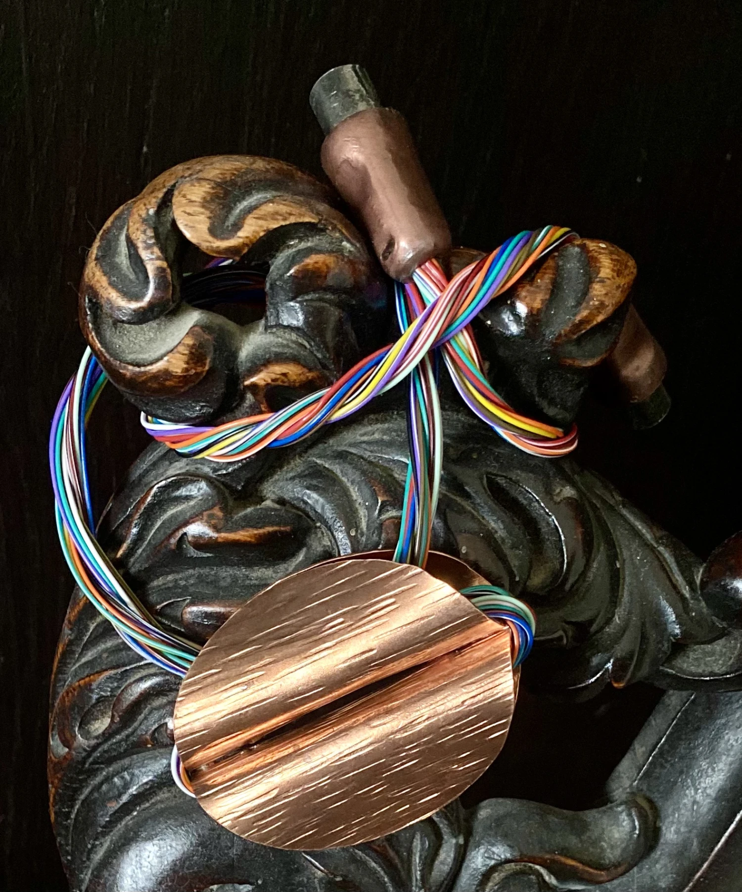 *Tethered*, copper, discarded electrical cables, 25 x 7 cm.