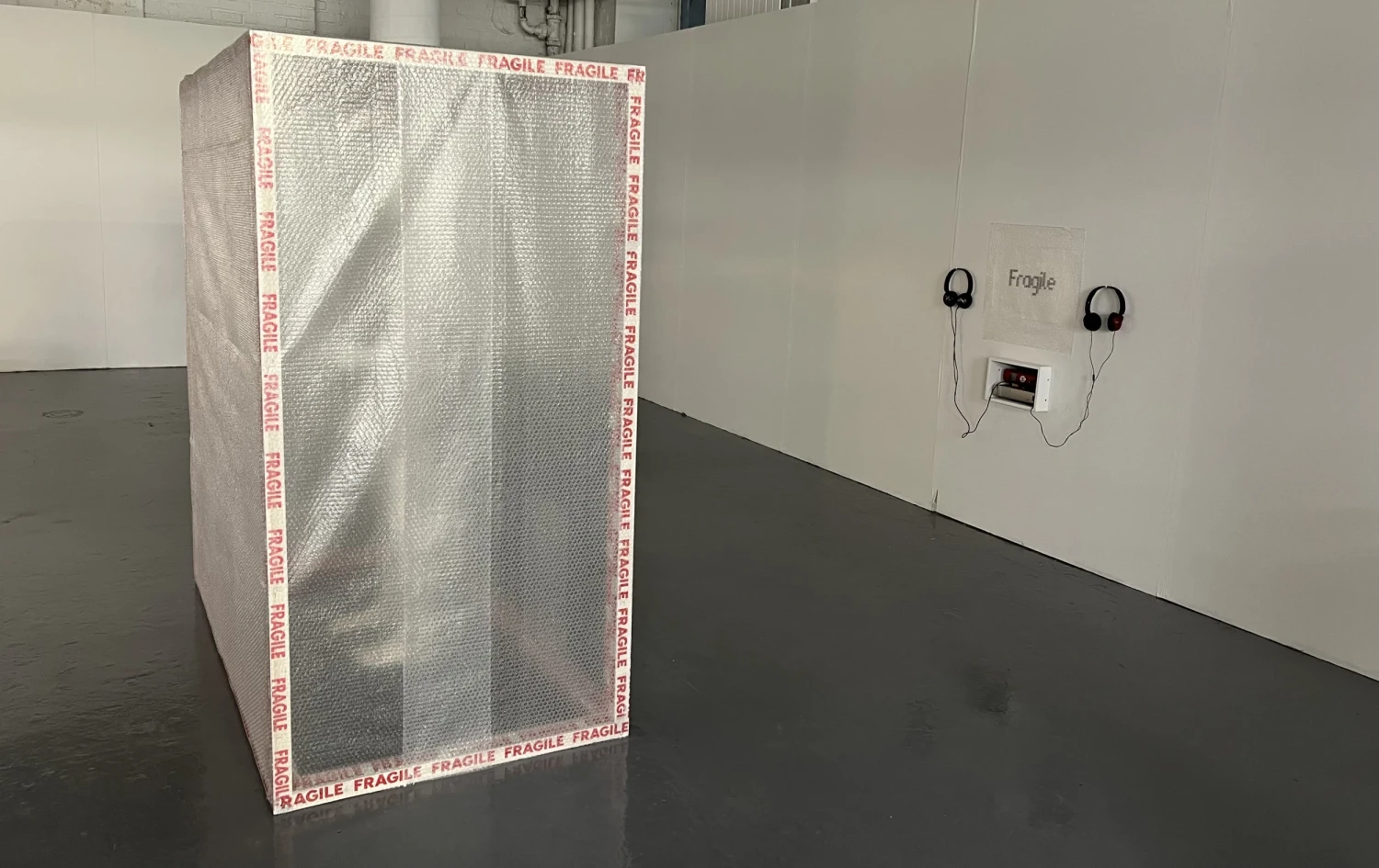 Side installation view showing containment within the structure.