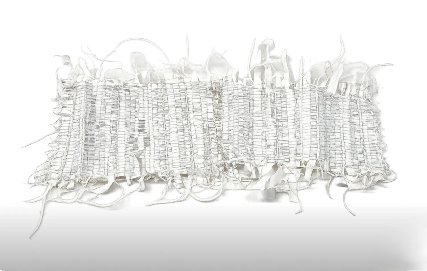 Woven papers with choral sheets, paper wire, cord and string in the loom, 80 x 60 cm.