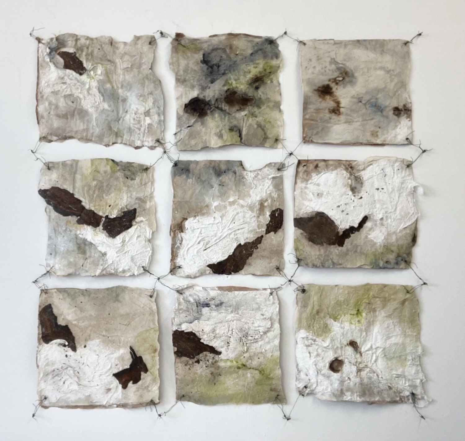 Mixed-media on prepared layered handmade surface.