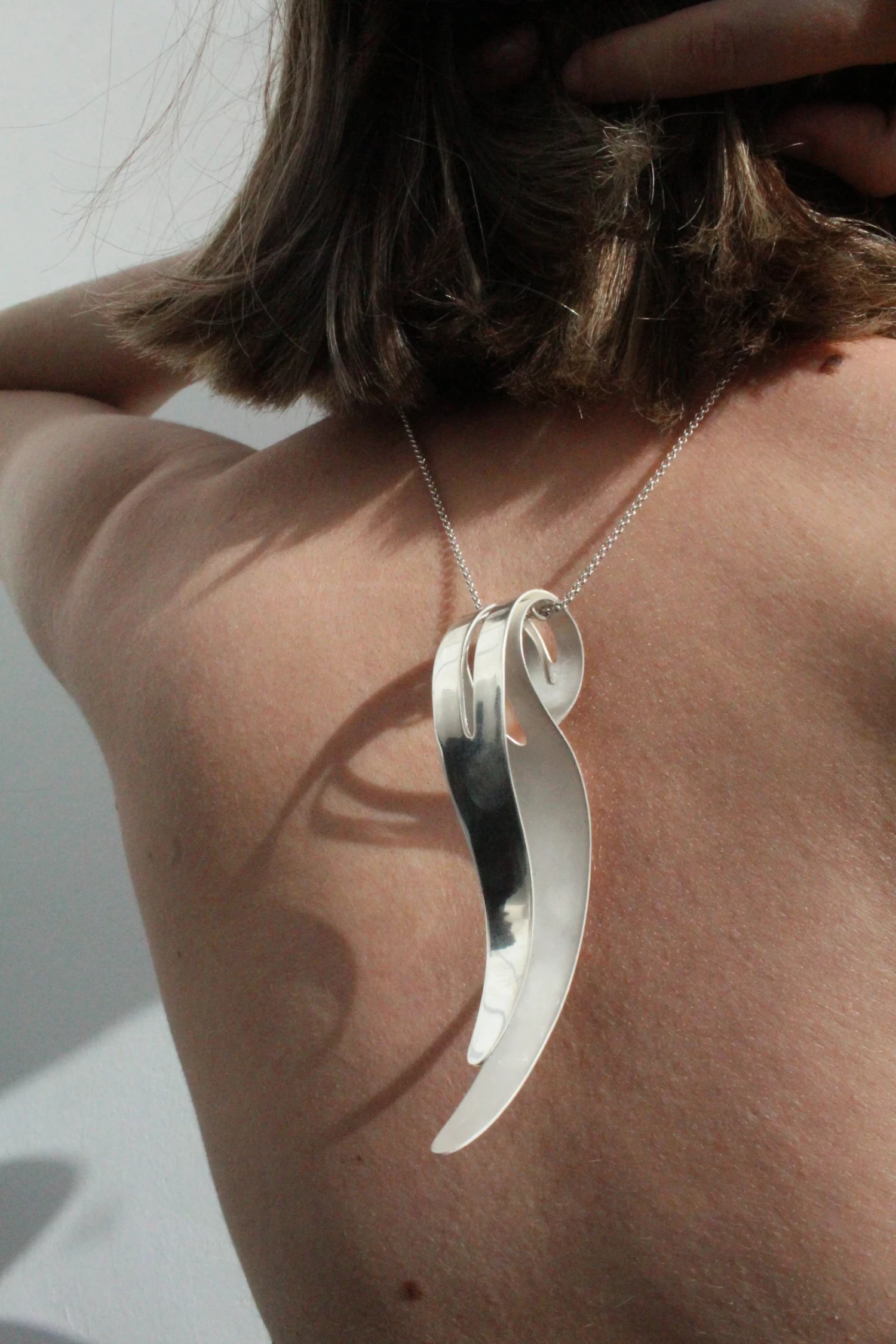 *Covert Curl* pendant 935 sterling silver.