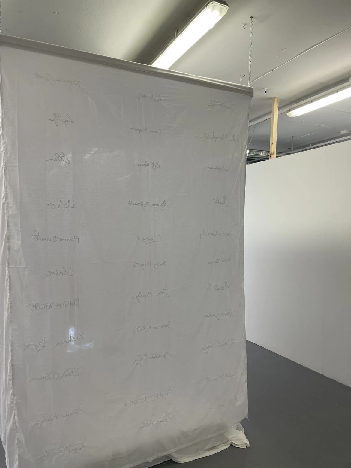 Installation exterior view, embroidered signatures, NCAD Works 2026.
