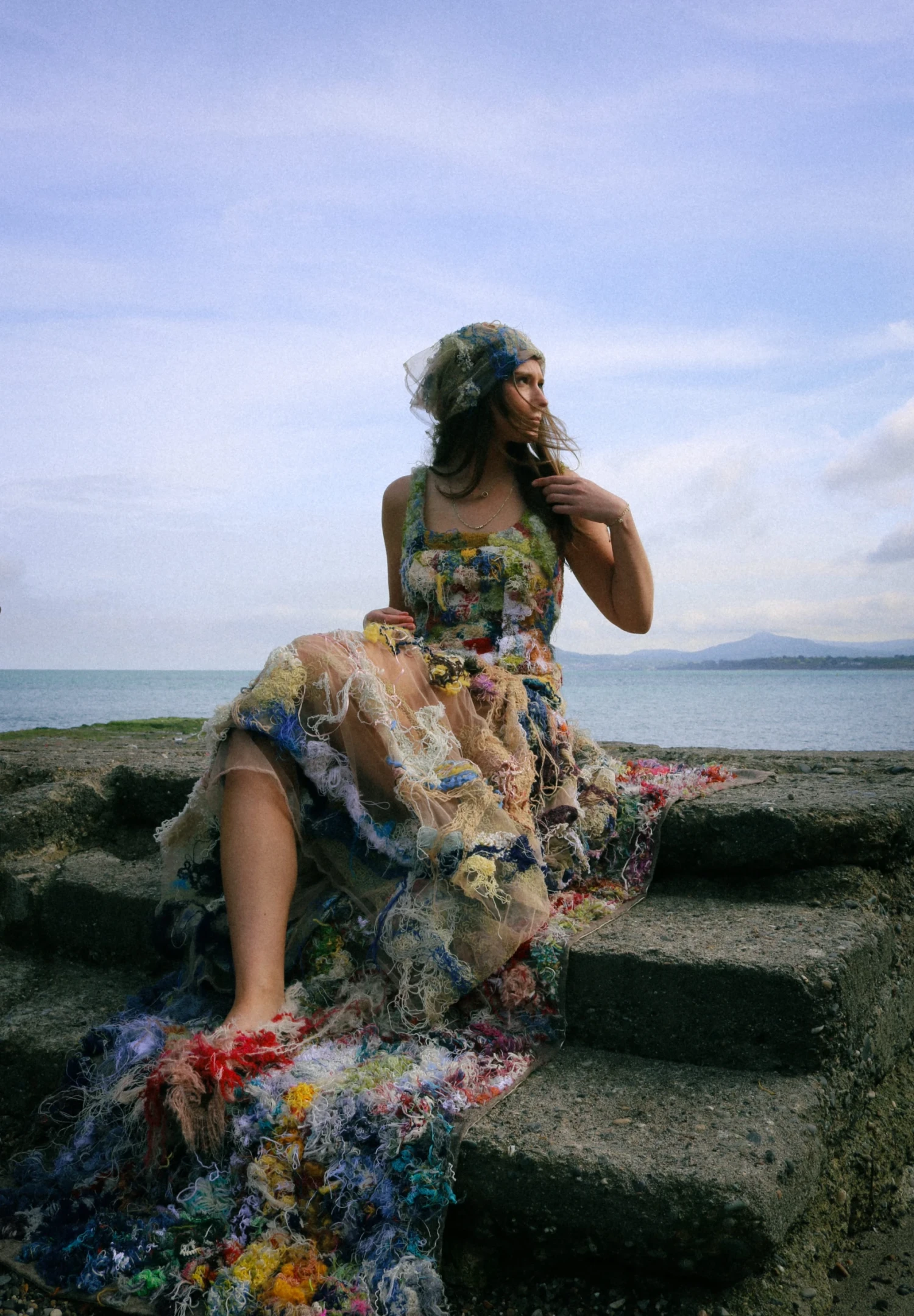 Clahane dress creaed by felting waste yarn onto tulle and then securing with digital embroidery.