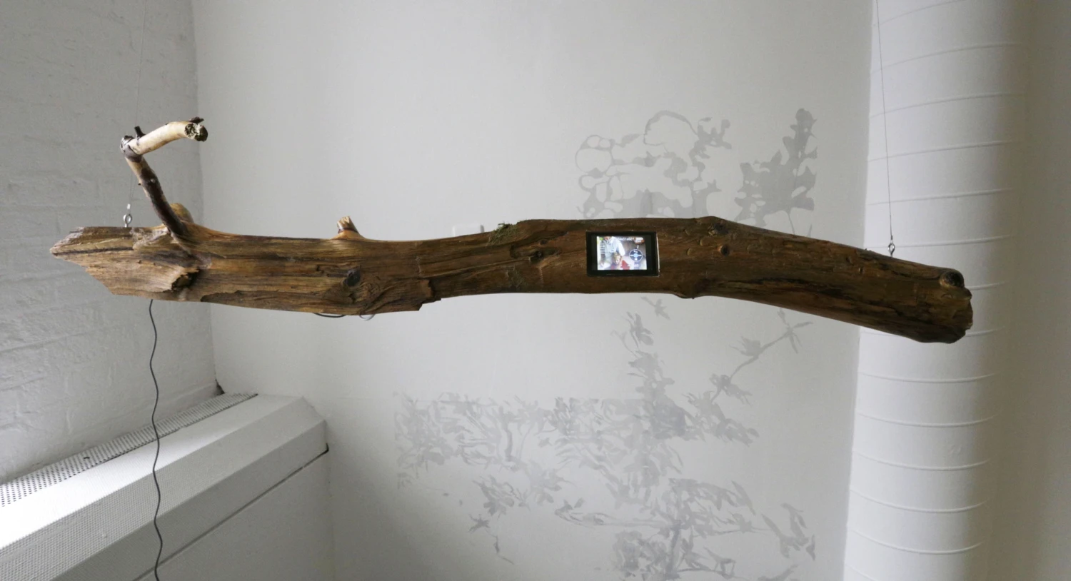*Can You Go Back?*, screen in found wood.
