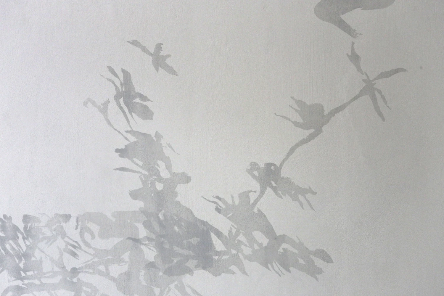 Screen printed backdrop on wall.