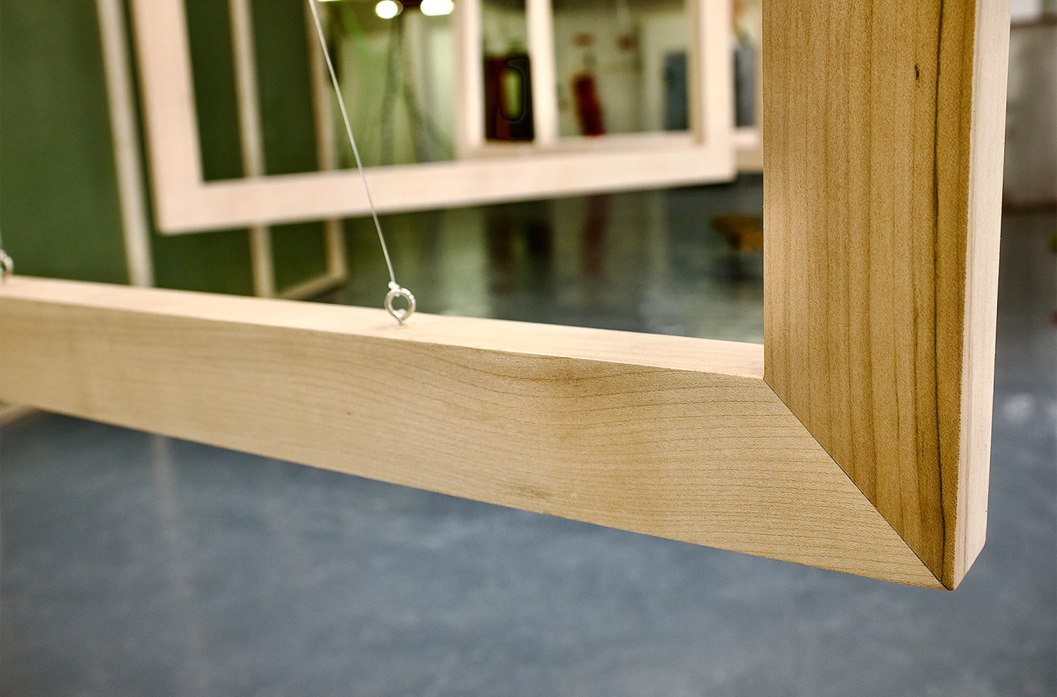 *This Body is My Body*, oak wood hand-made frames, stretched latex with metal hooks, 185.42 x 91.44 cm.