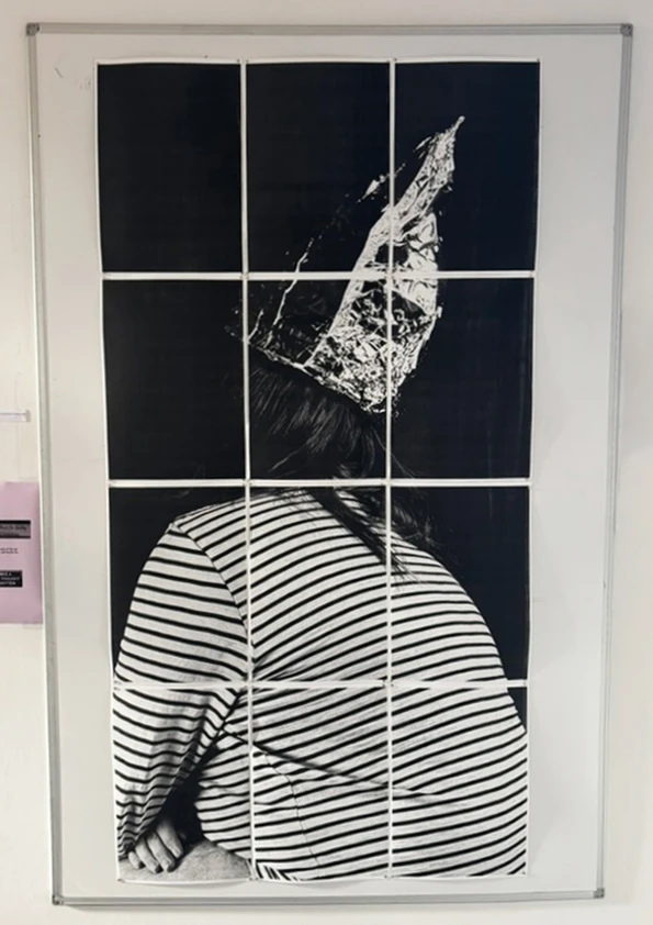 *the internet used to be a place in your home now it's somewhere lodged under one of my ribs*, (2025), photocopy, magnets, 168 x 89.1 cm.