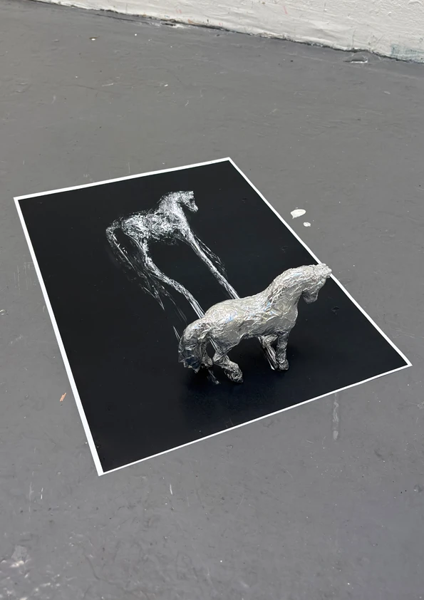 *current affairs*, tinfoil, photocopy on paper, 29.7 x 42 cm.