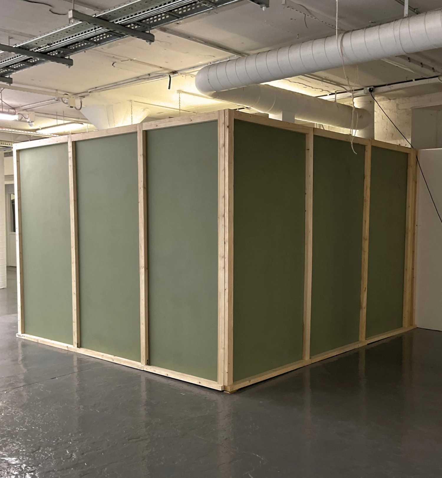 Installation view, *Nothing to Show*, MDF, rough cut timber, 3.5 x 3.5 x 2.44 m, NCAD Works 2026.