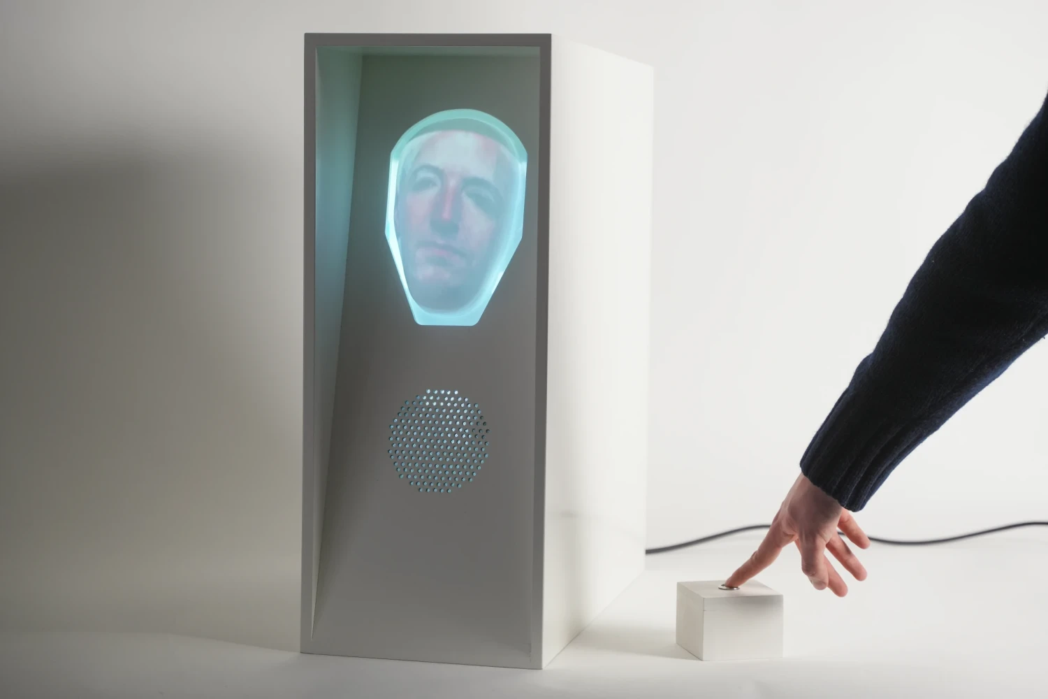 User presses the button to begin the interaction with the robot.