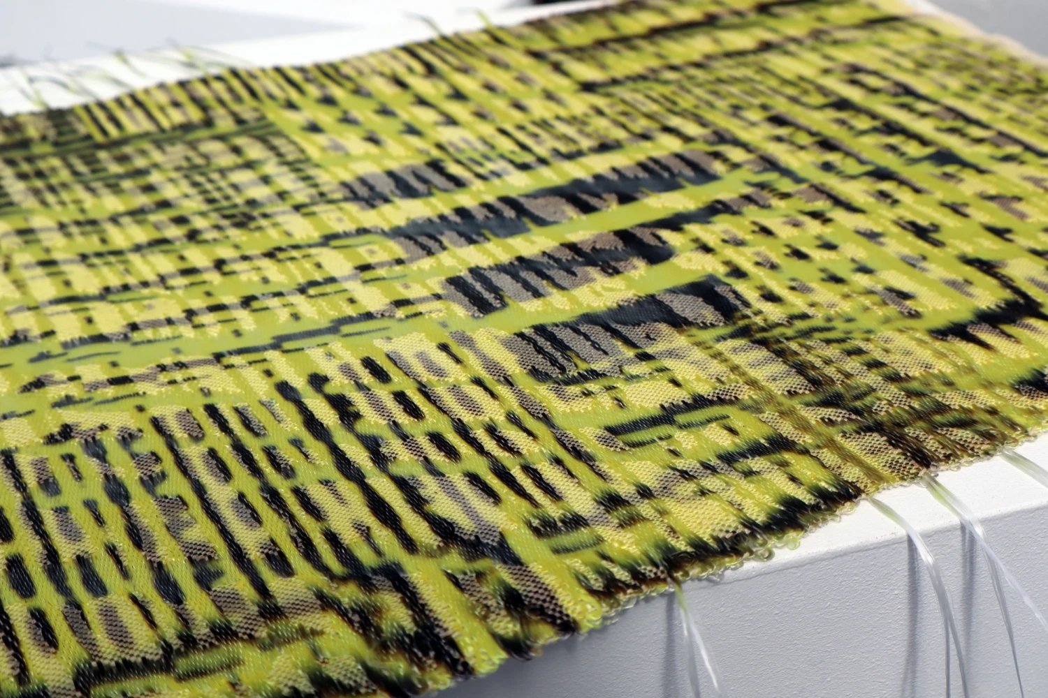 *Layered* jacquard, organic cotton and recycled polyester.