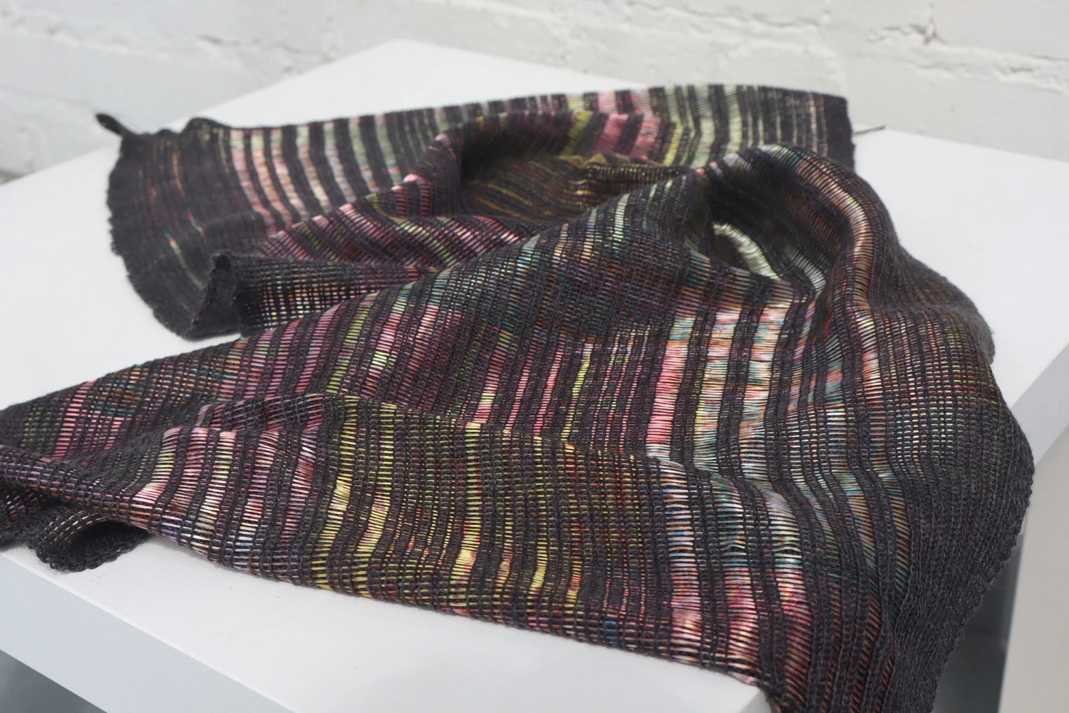 *Embedded*, merino and recycled polyester.