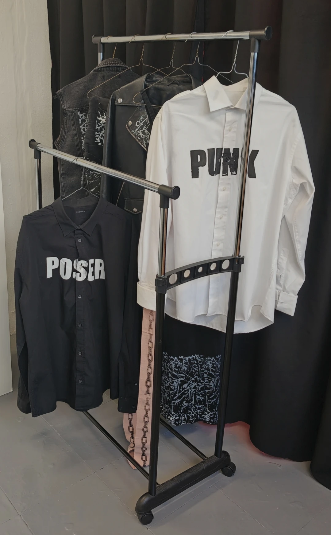 *Linked*, shirts attached with soft chain.