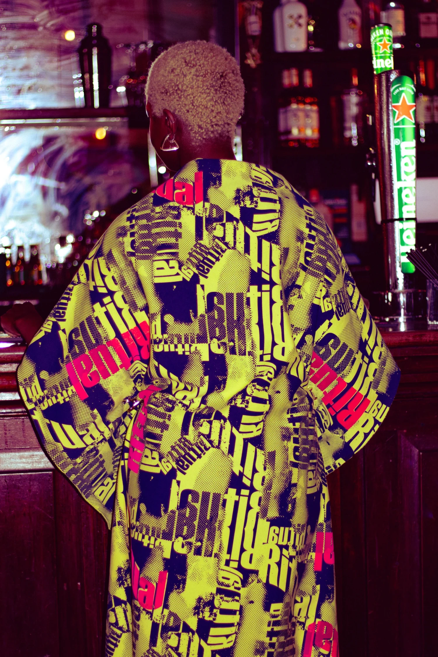 Screen print repeat pattern on cotton tracksuit.
