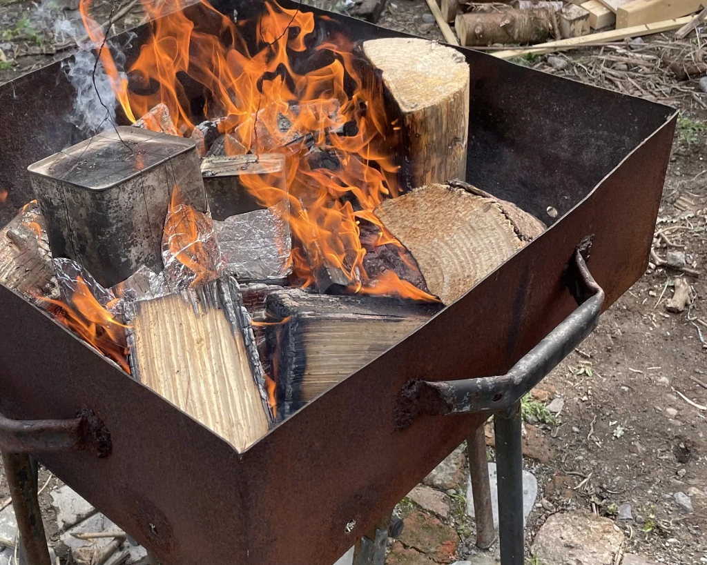 Making charcoal in The Field, NCAD.