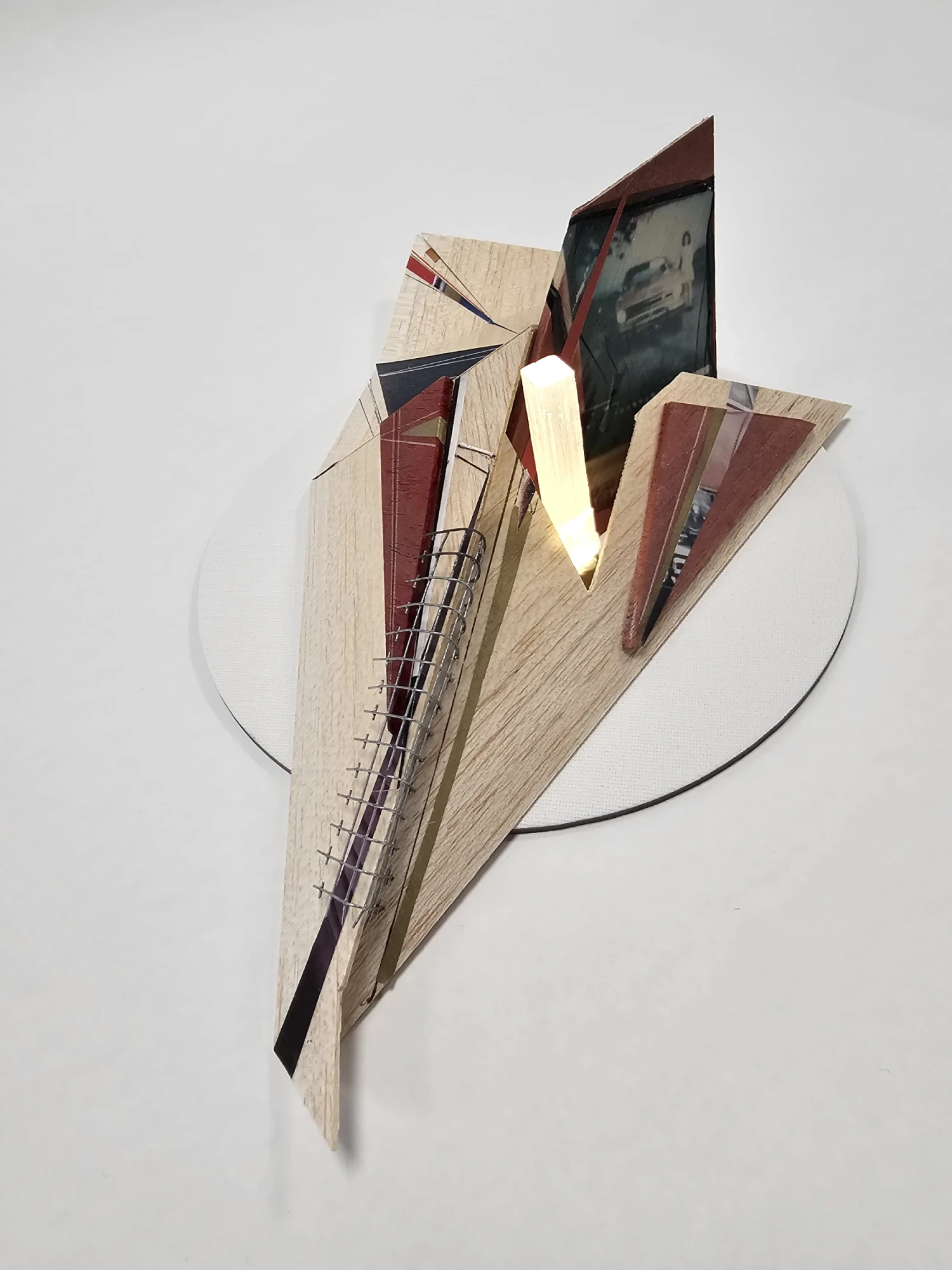 *Fragment II - Possibilities*, balsa, wire, collage, pen, ink, emulsion lift, selenite rod, LED, 28 x 12 x 10 cm.