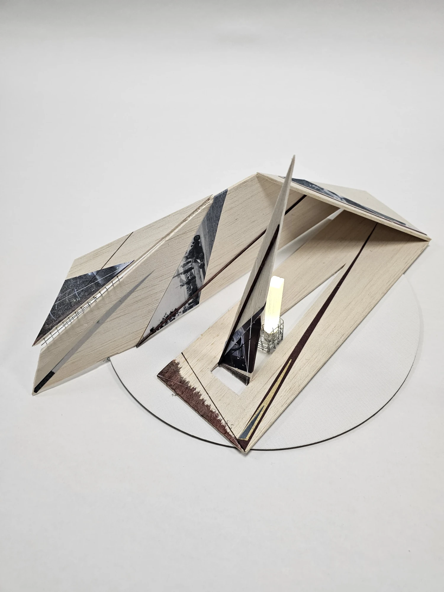 *Fragment III - Velocity*, balsa, wire, collage, pen, ink, emulsion lift, selenite rod, LED, 37 x 18 x 10 cm.