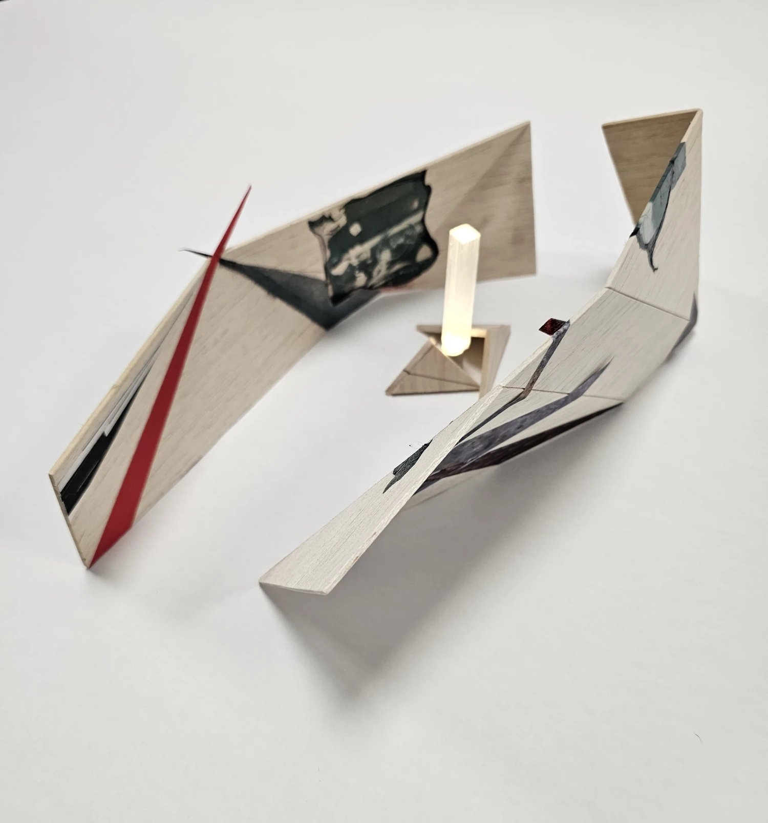 *Fragment VII - Mark II*, balsa, wire, collage, pen, ink, emulsion lift, selenite rod, LED, 28 x 10 x 10 cm.