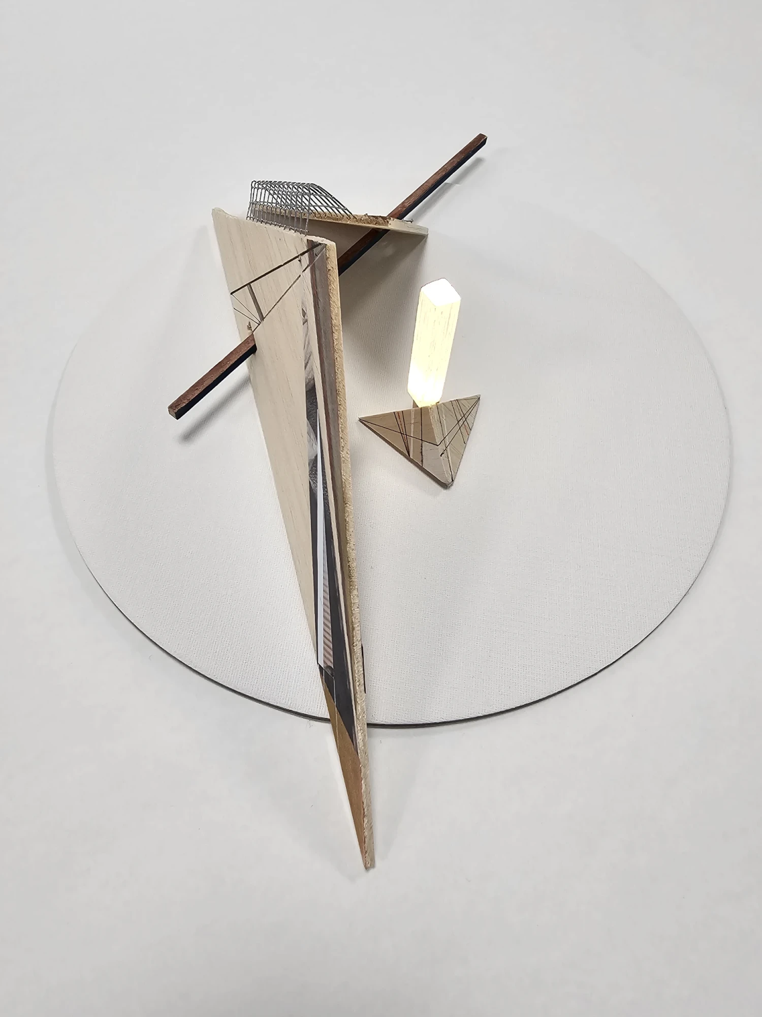 *Fragment IV - Transection*, balsa, wire, collage, pen, ink, selenite rod, LED, 32 x 12 x 10 cm.
